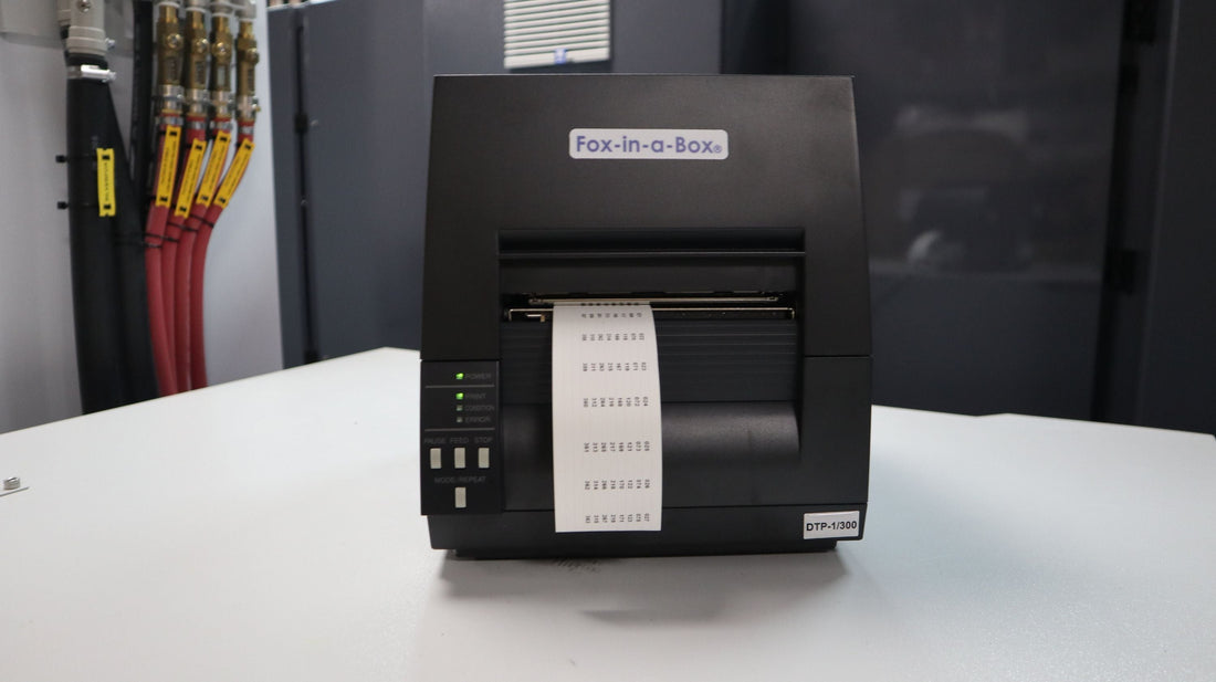 Fox-in-a-Box thermal transfer label printer, with patch panel labels being printed in an industrial setting  